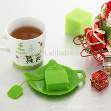 té de cerámica del regalo de la Navidad fijado con el infuser del té del silicón y la bolsita de té ordenada